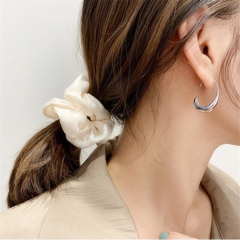 Luxury earrings made of gold and silver