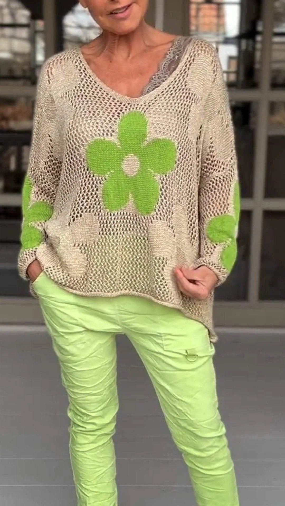 V-neck knitted blouse with floral pattern