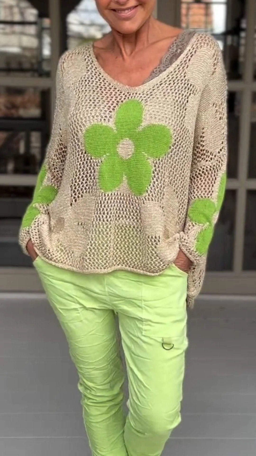 V-neck knitted blouse with floral pattern